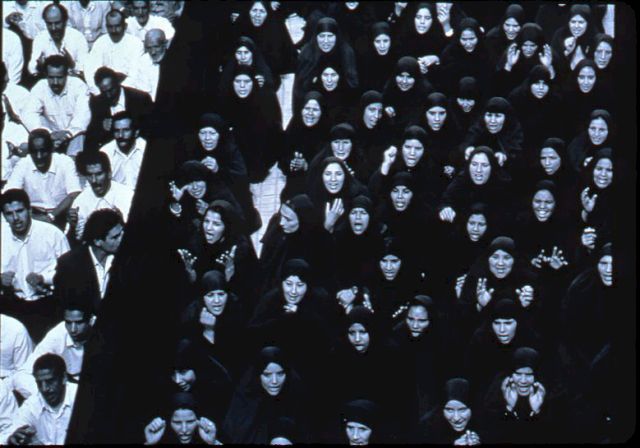 Shirin Neshat, Fervor (Crowd from front, Couple looking at each other), 2000. Courtesy Collezione Morra Greco, Napoli