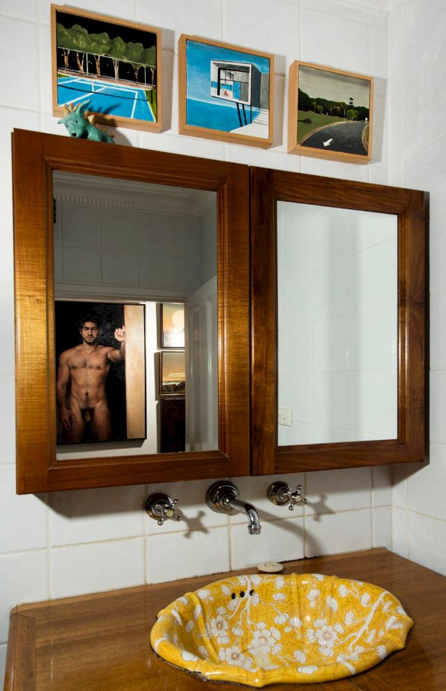 Bathroom (installation view) with works by Noel McKenna, Anne Ross and Peter Churcher (reflected in mirror). Image: Christopher Pearce