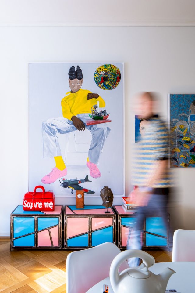 Painting Pop Culture & Memorabilia by Wole Lagunju; Supreme mini-coffin by Paa Joe; Nepalese fright mask; Graphik cabinet by Ousmane Mbaye Design. Photo: Sacha Di Poi. Courtesy of Olivier Chow