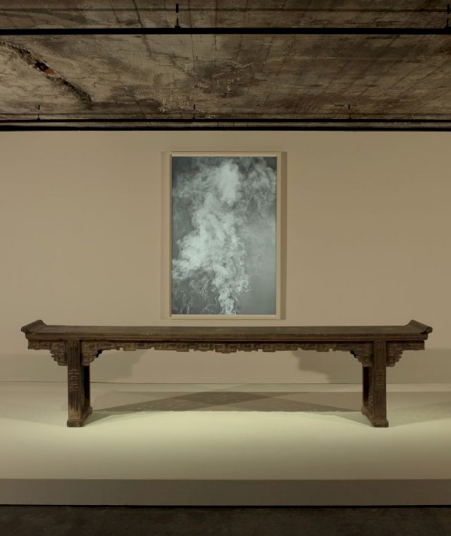 Installation view of The Feuerle Collection, Berlin. Large side table with everted ends, 17th Century; Adam Fuss, ’Smoke’. Photo: Nic Tenwiggenhorn – © VG Bild-Kunst, Bonn 2017