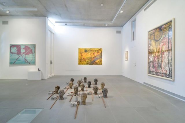 (floor) Erez Israeli; (left) Moshe Kupferman; (right and middle) Moshe Gershuni (Installation view of "Sorting Out" at the Givon Art Forum, Tel Aviv)